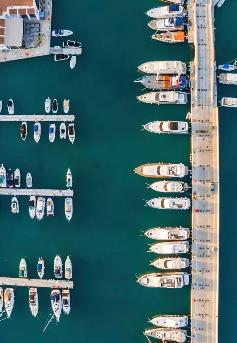 Rows of berthed boats seen from above
